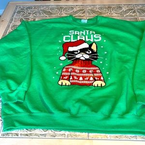 Gildan Christmas sweatshirt with Santa Claws print on front. Size XL.